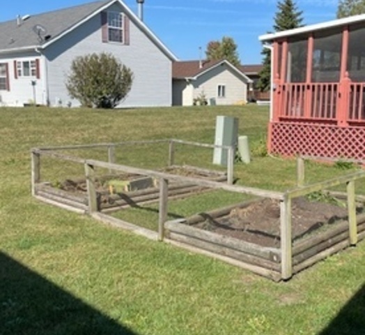 895 Cherry Street Manteno, IL 60950 - Photo 33 of 38 a front view of a house with a yard
