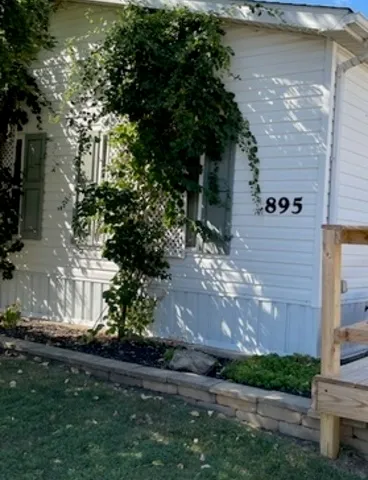 a view of a yard in front of a house