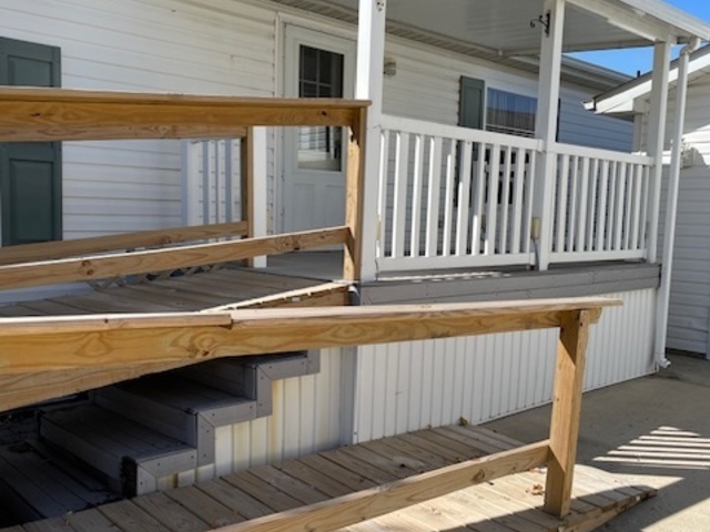 895 Cherry Street Manteno, IL 60950 - Photo 37 of 38 a view of a wooden house with a large window