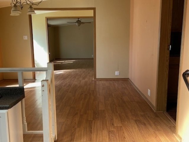 895 Cherry Street Manteno, IL 60950 - Photo 8 of 38 a view of a hallway with wooden floor