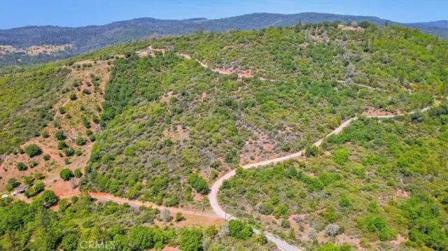 a view of a field with an outdoor space