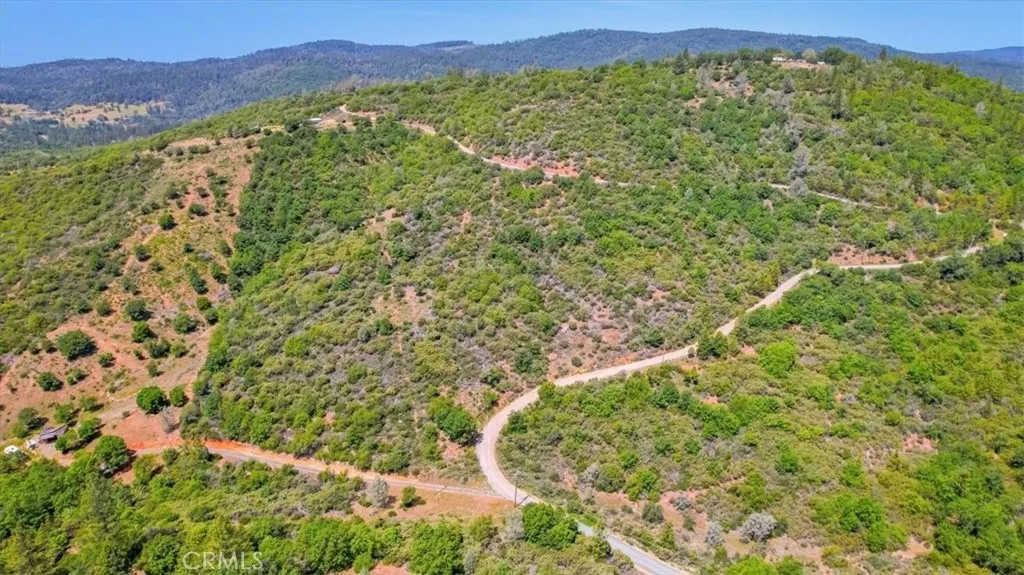 23 Clark Ranch Way Dobbins, CA 95935 - Photo 30 of 42 a view of a lush green field with a mountain in the background