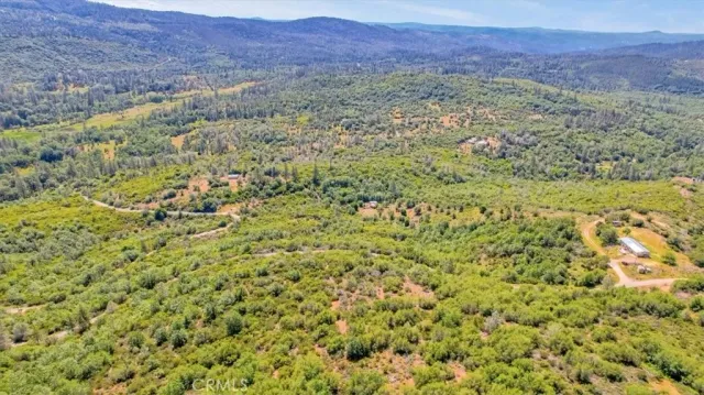 a view of a field with an outdoor space