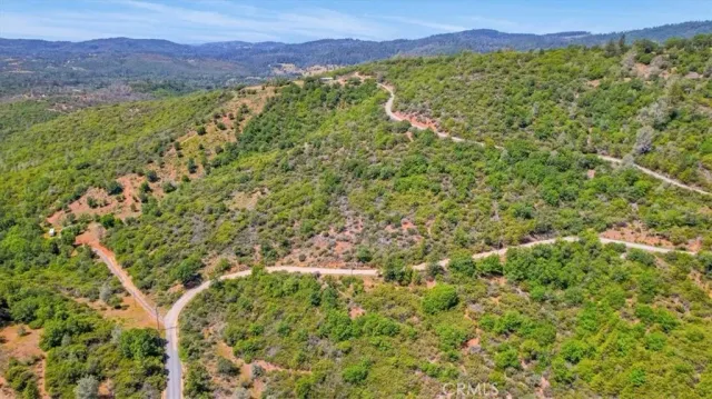 a view of a yard with an outdoor space and seating