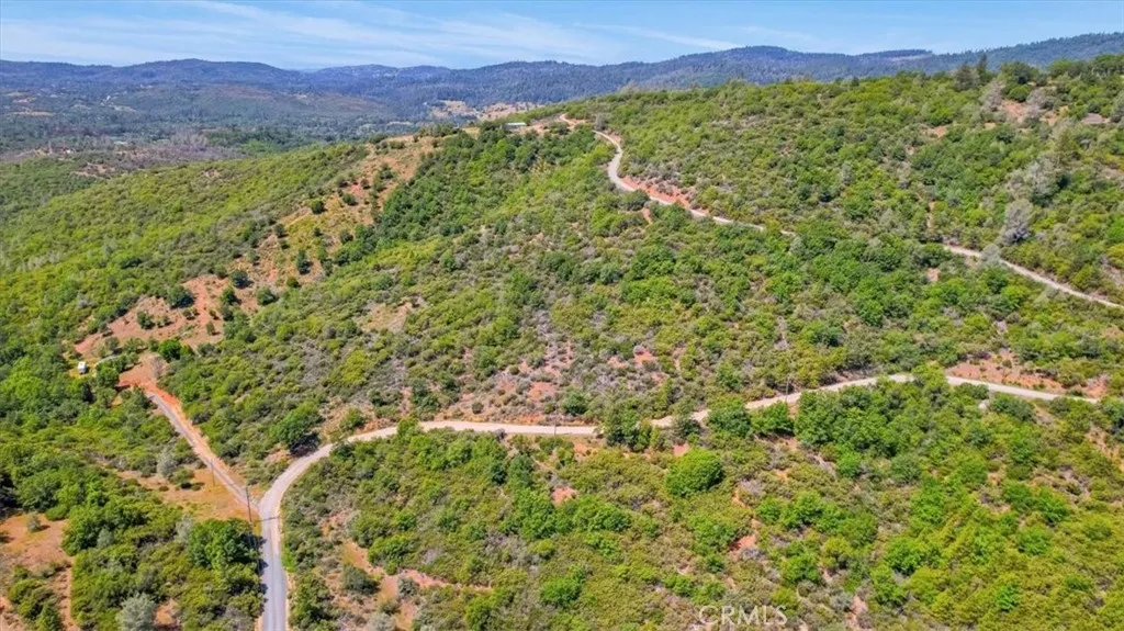 23 Clark Ranch Way Dobbins, CA 95935 - Photo 33 of 42 a view of a lush green field with a mountain in the background