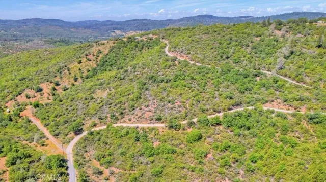 a view of a yard with an outdoor space and seating