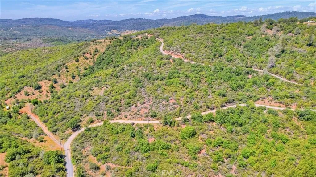 23 Clark Ranch Way Dobbins, CA 95935 - Photo 34 of 42 a view of a yard with an outdoor space and seating