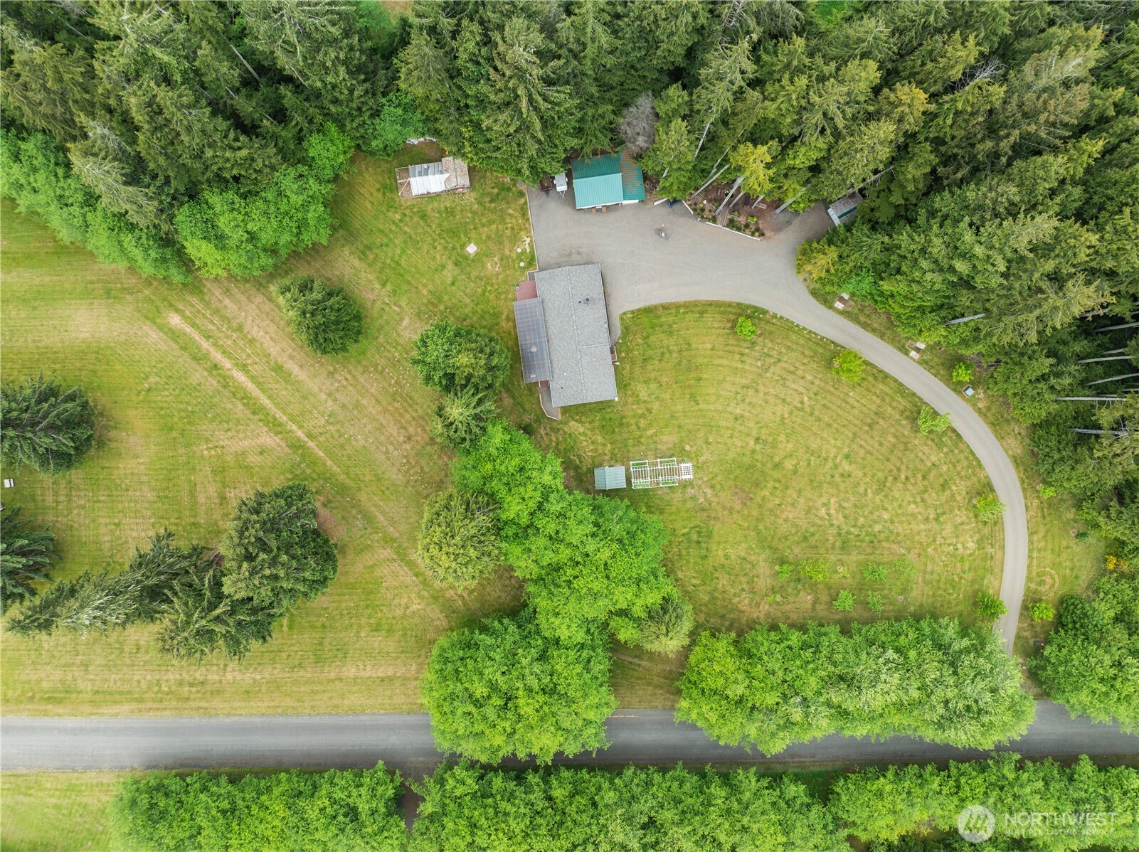 132 River Park Road Forks, WA 98331 - Photo 40 of 40 an aerial view of a residential houses with yard and swimming pool