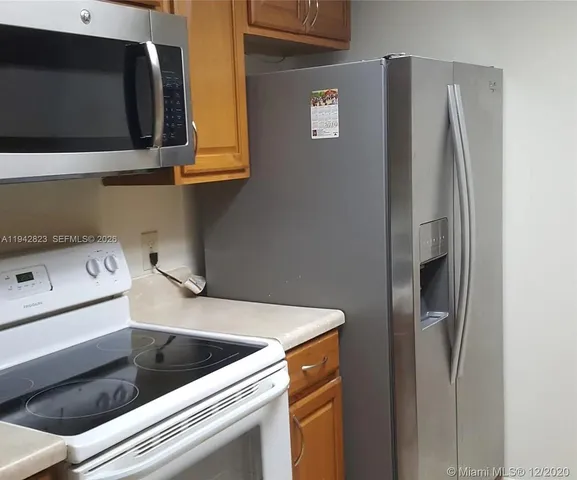 a bathroom with a sink a vanity and a mirror