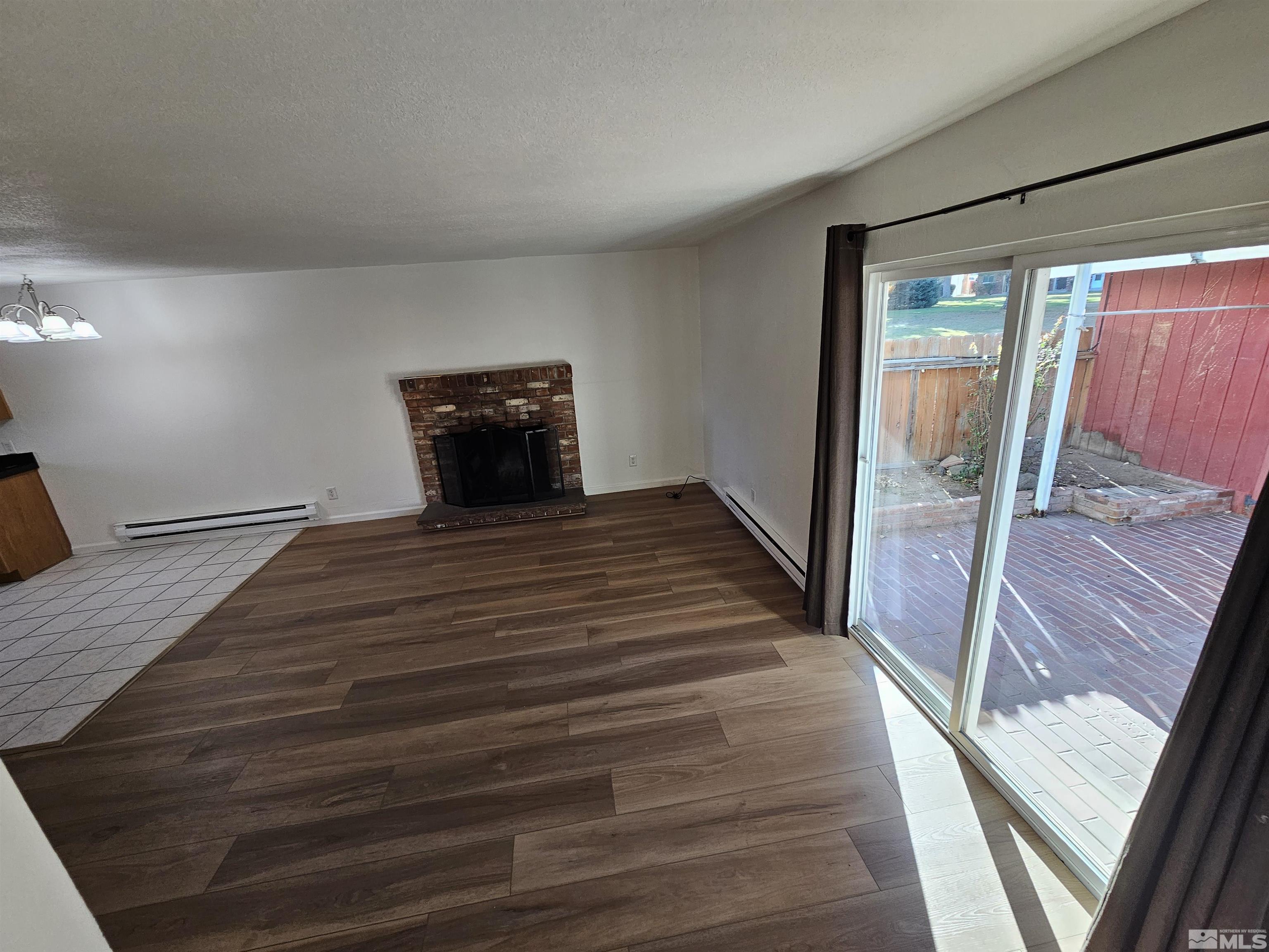 163 Smithridge Park Reno, NV 89502 - Photo 11 of 28 a bedroom with a bed and large window