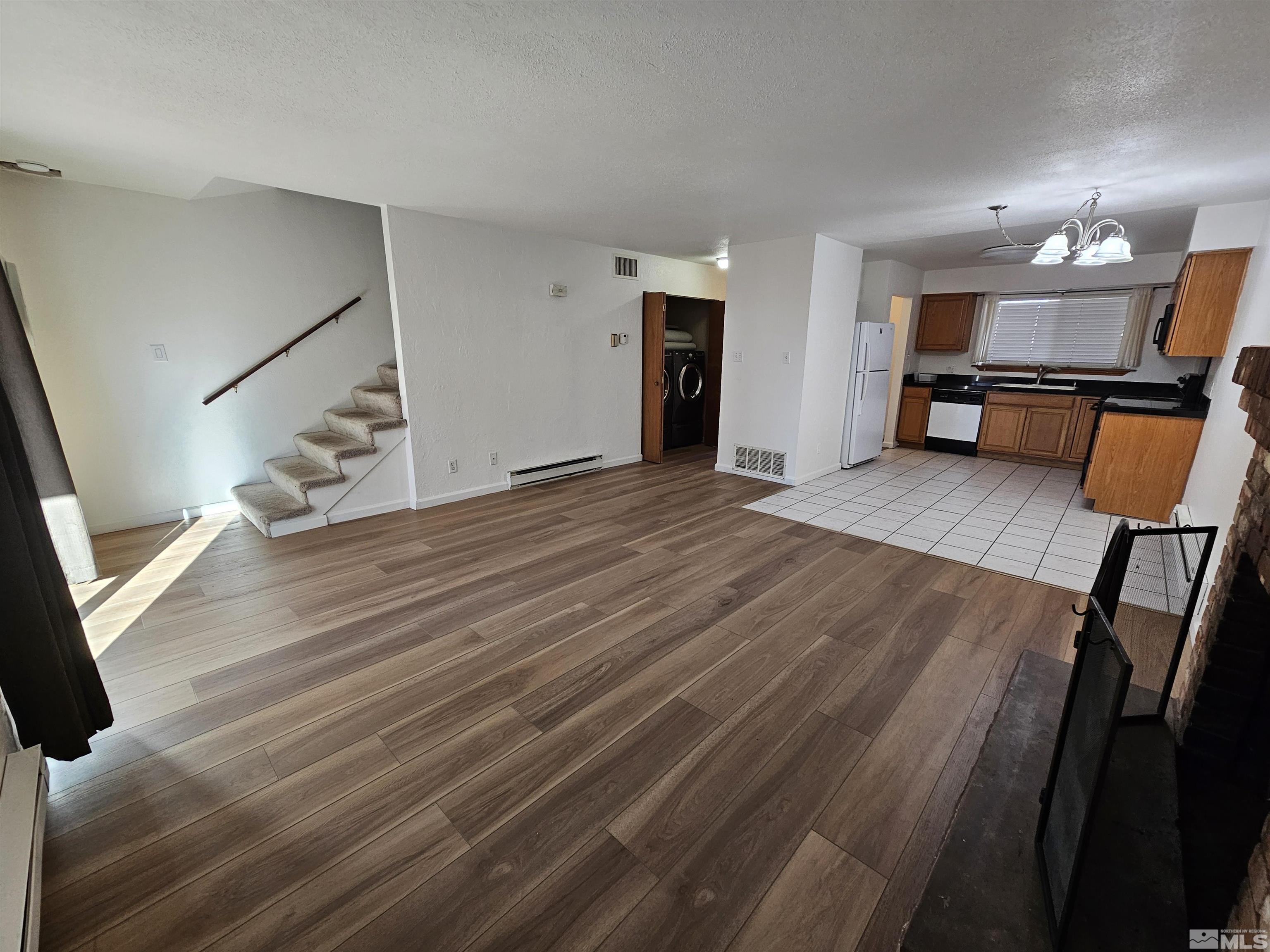 163 Smithridge Park Reno, NV 89502 - Photo 6 of 28 a view of kitchen with sink and refrigerator