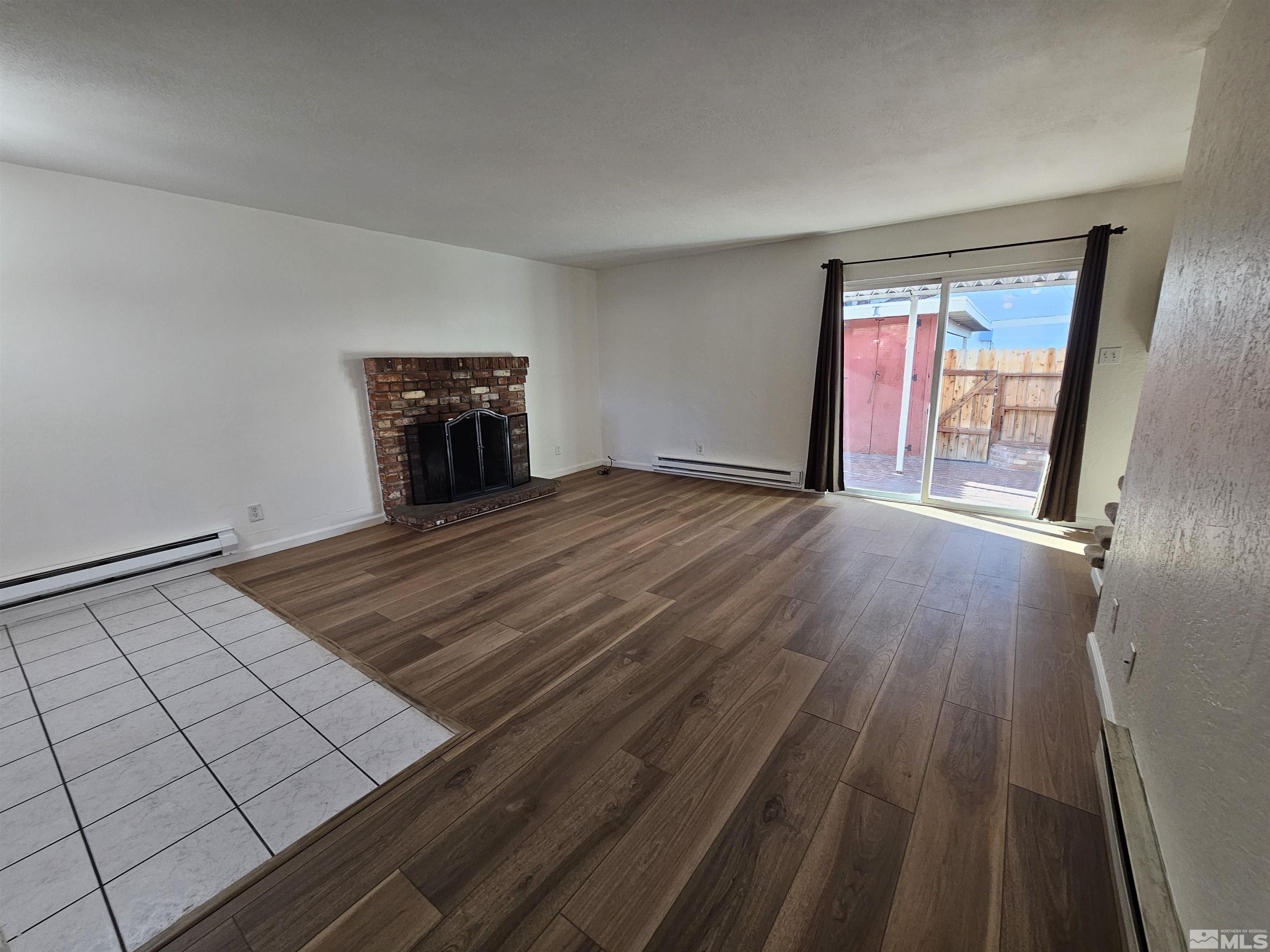 163 Smithridge Park Reno, NV 89502 - Photo 8 of 28 a view of an empty room and window