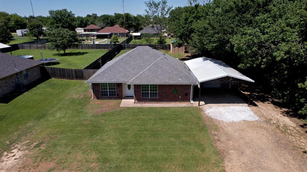1974 County Road Powderly, TX 75473 - Photo 26 of 28 an aerial view of a house