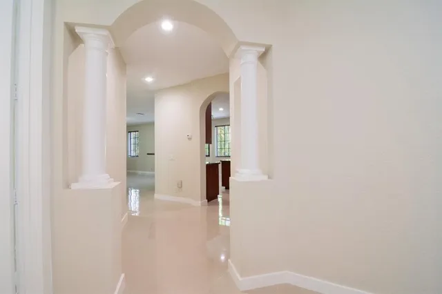 a view of entryway with bathroom