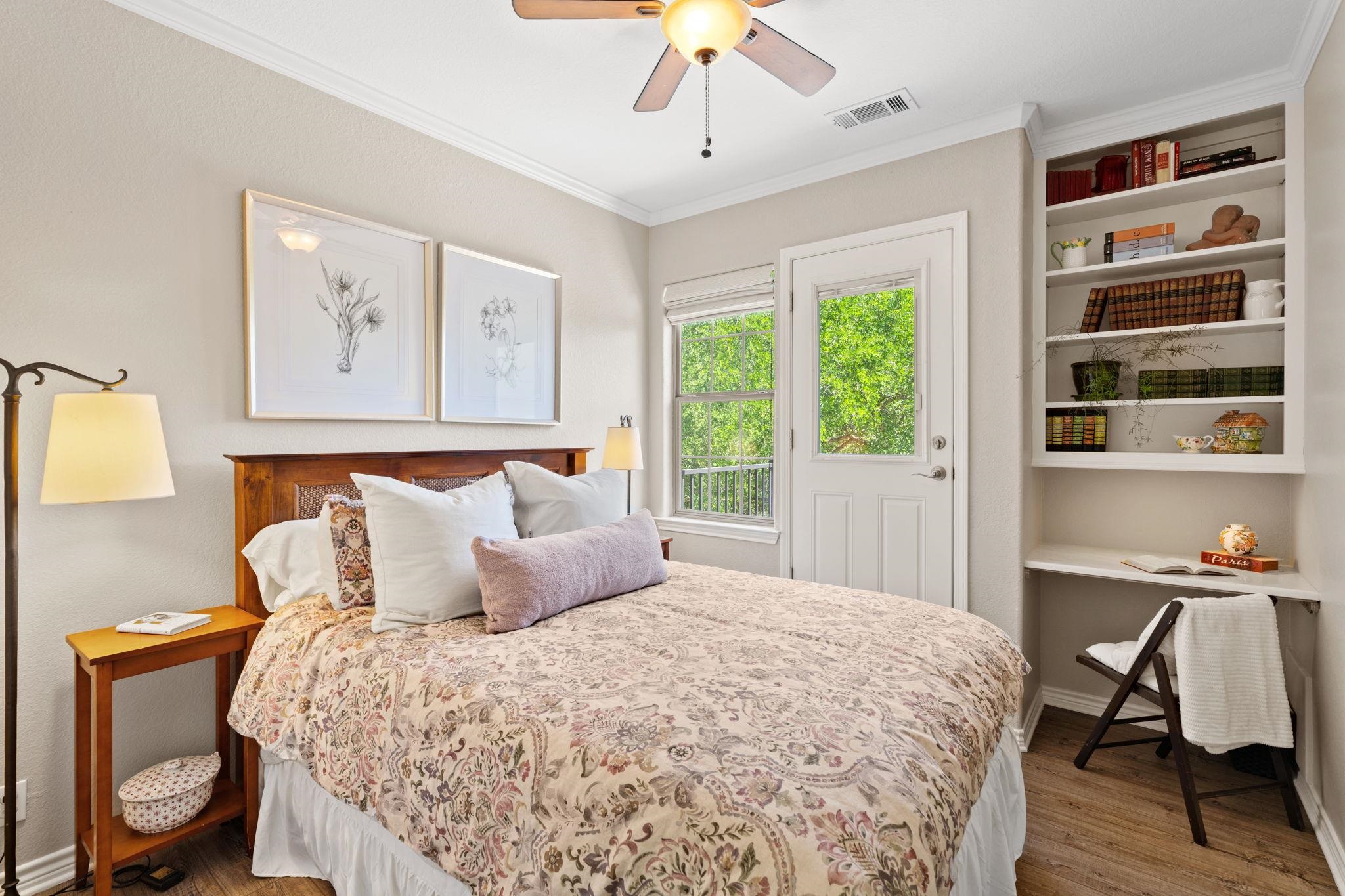 2409 Mormon Mill Road Marble Falls, TX 78654 - Photo 12 of 30 a bedroom with a large bed and a window