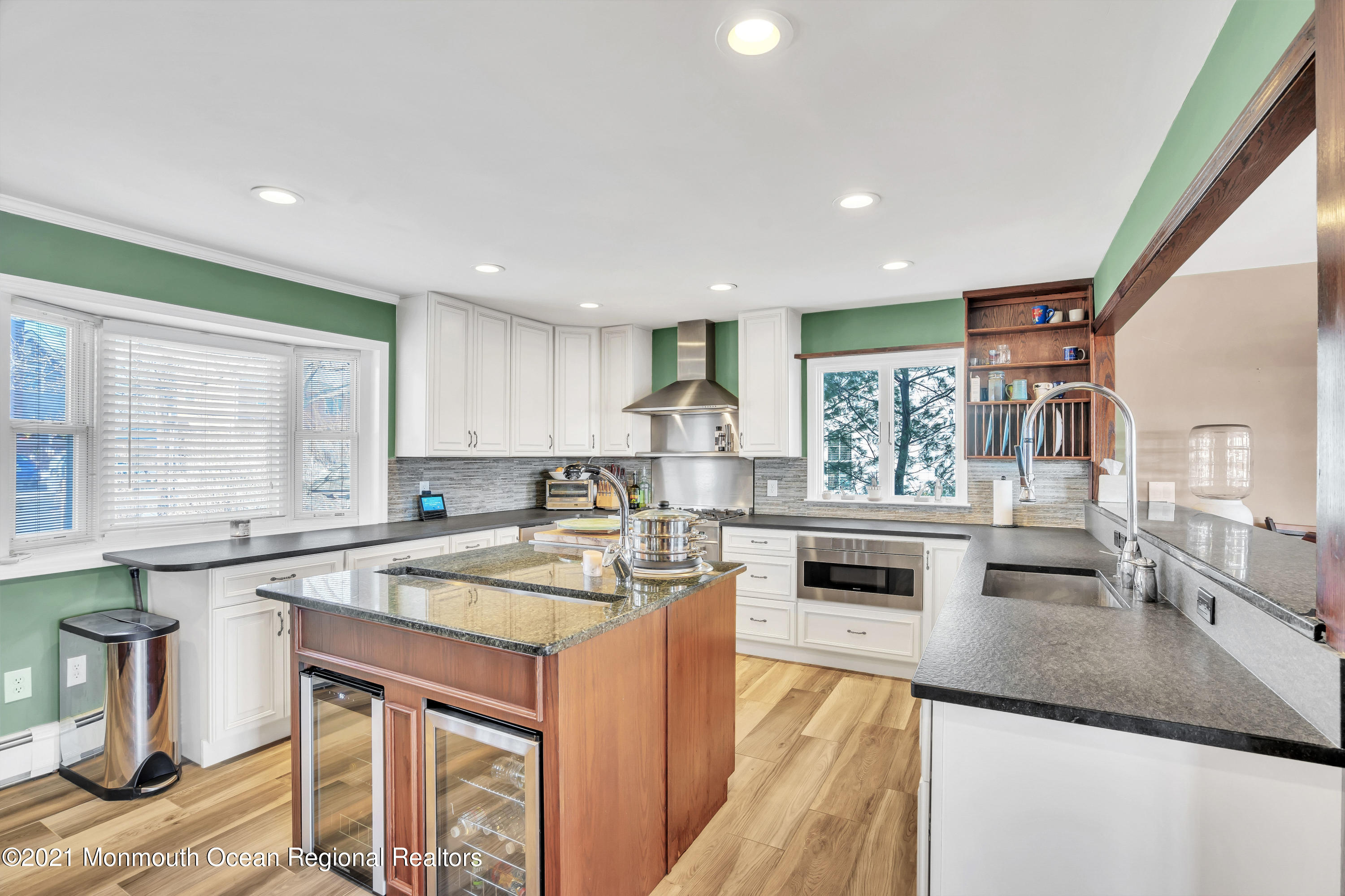 139 Riverside Drive North Brick, NJ 08724 - Photo 12 of 67 a kitchen with stainless steel appliances granite countertop a stove a sink and a microwave