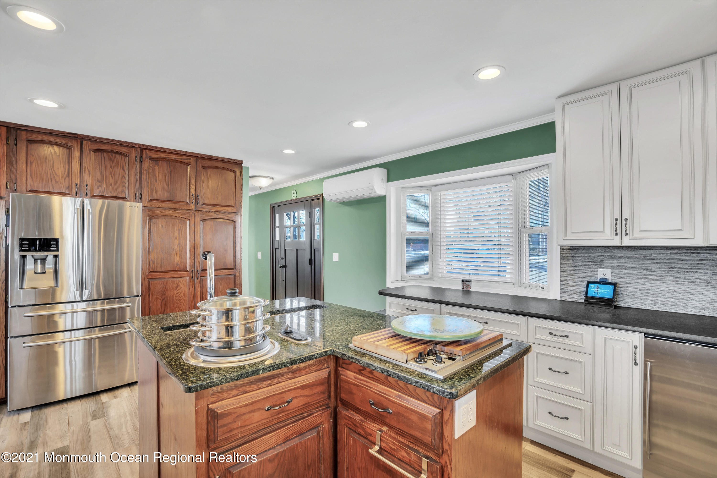 139 Riverside Drive North Brick, NJ 08724 - Photo 14 of 67 a kitchen with kitchen island granite countertop a sink stove and refrigerator