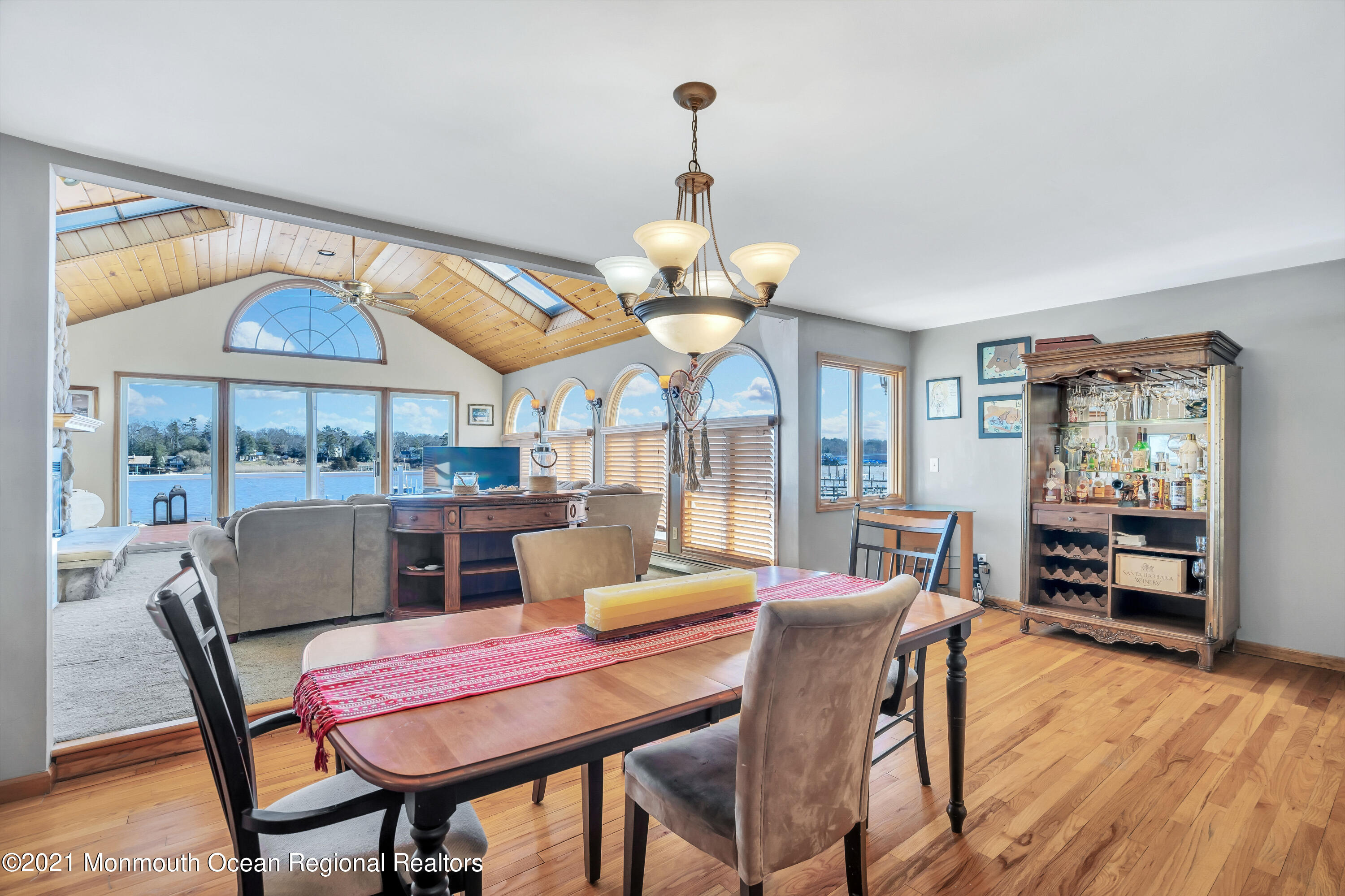 139 Riverside Drive North Brick, NJ 08724 - Photo 18 of 67 a dining room with furniture a chandelier and wooden floor