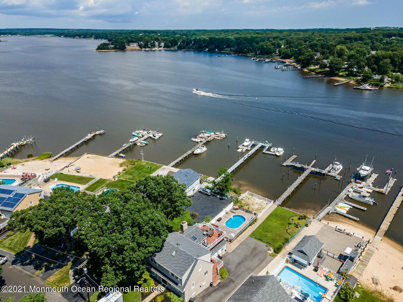 139 Riverside Drive North Brick, NJ 08724 - Photo 3 of 67 an aerial view of a house with a lake view