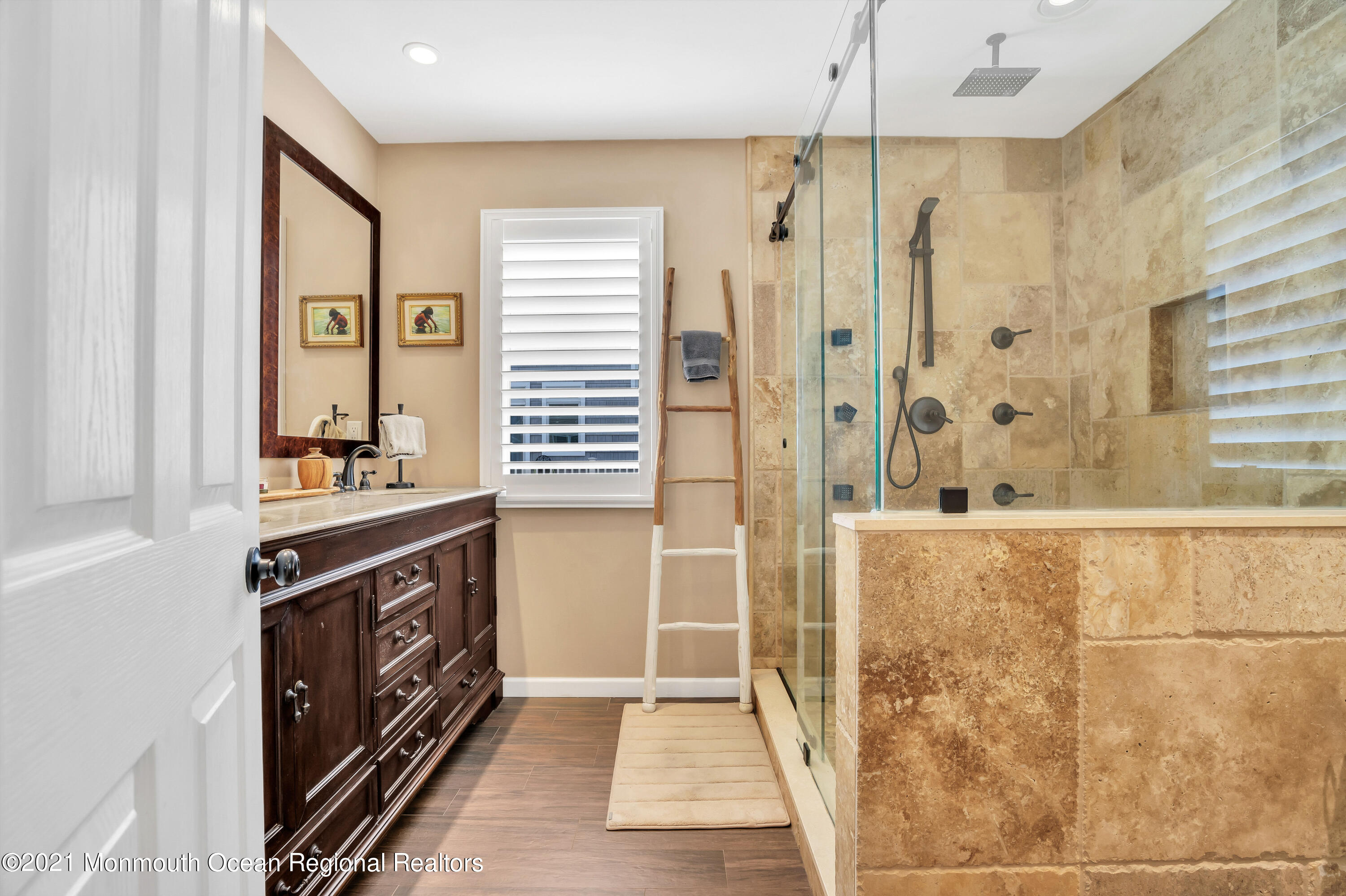 139 Riverside Drive North Brick, NJ 08724 - Photo 29 of 67 a bathroom with a double vanity sink a mirror and a shower