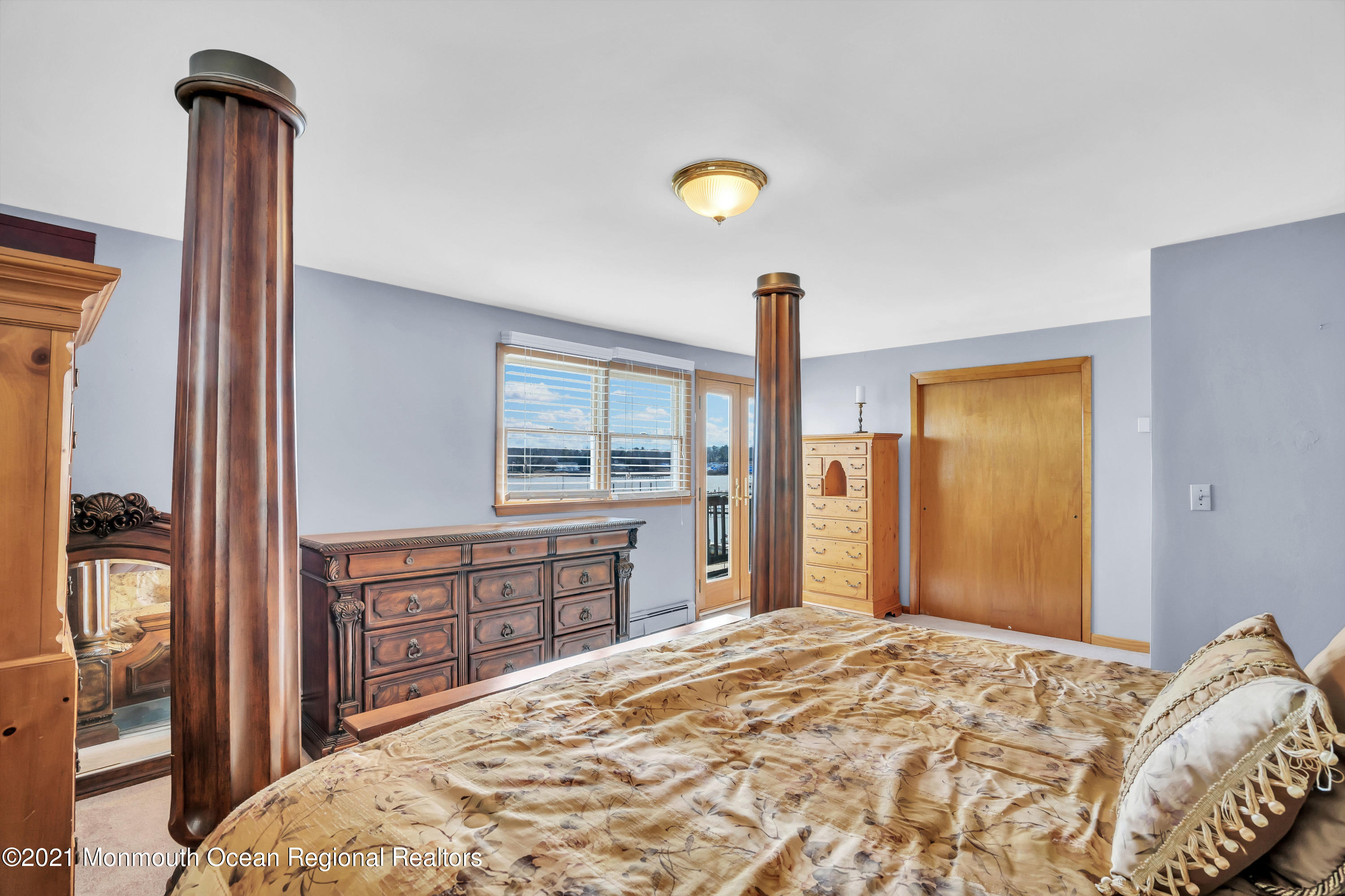 139 Riverside Drive North Brick, NJ 08724 - Photo 37 of 67 a bed sitting in a bedroom next to a window