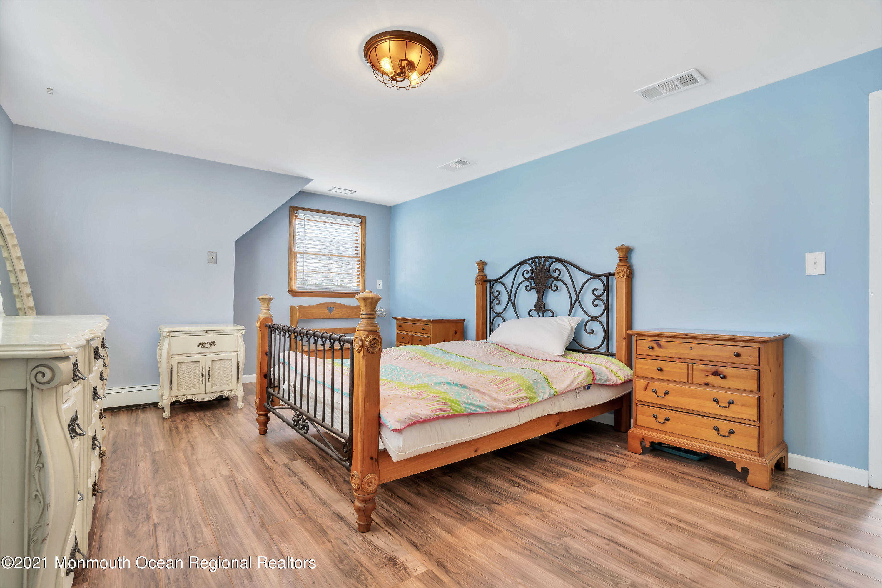 139 Riverside Drive North Brick, NJ 08724 - Photo 40 of 67 a bedroom with a bed and a window