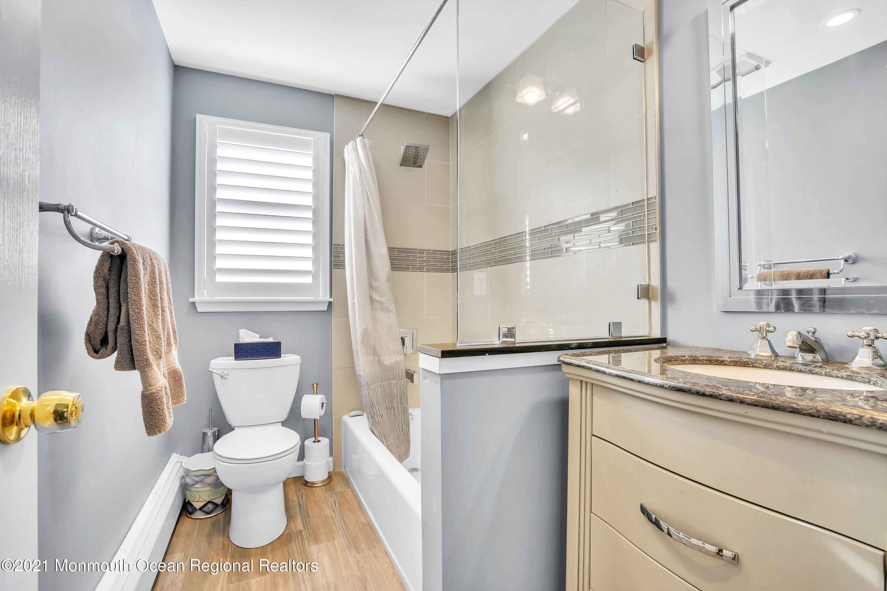 139 Riverside Drive North Brick, NJ 08724 - Photo 45 of 67 a bathroom with a toilet sink and mirror