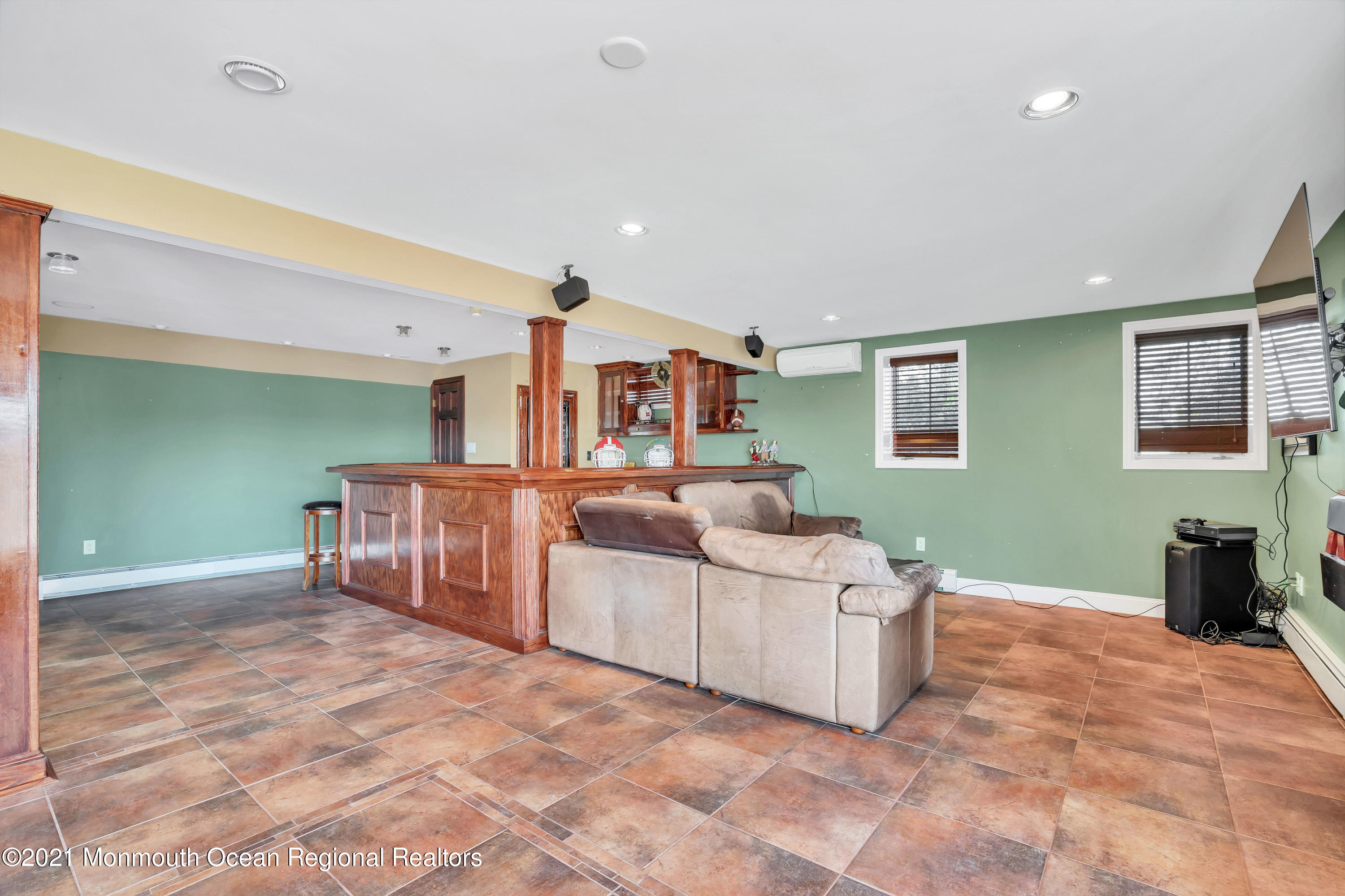 139 Riverside Drive North Brick, NJ 08724 - Photo 52 of 67 a living room with furniture and a flat screen tv