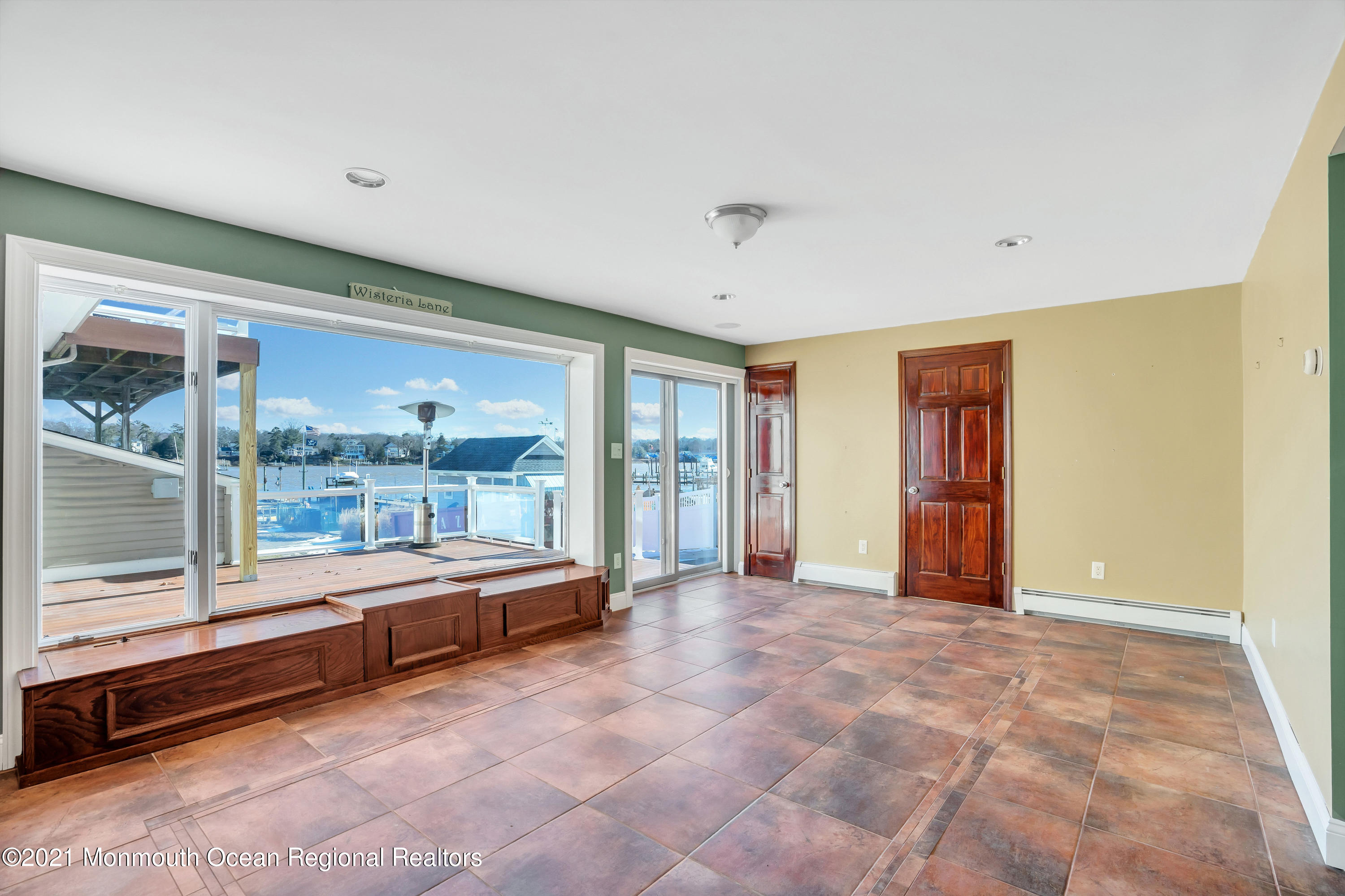 139 Riverside Drive North Brick, NJ 08724 - Photo 55 of 67 a large room with a large window and a large mirror