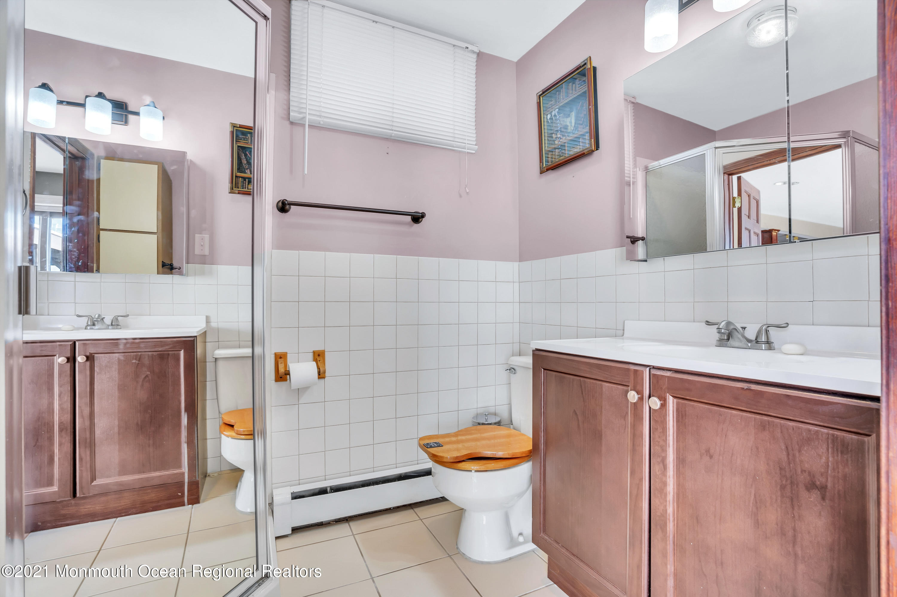 139 Riverside Drive North Brick, NJ 08724 - Photo 56 of 67 a bathroom with a toilet sink and mirror