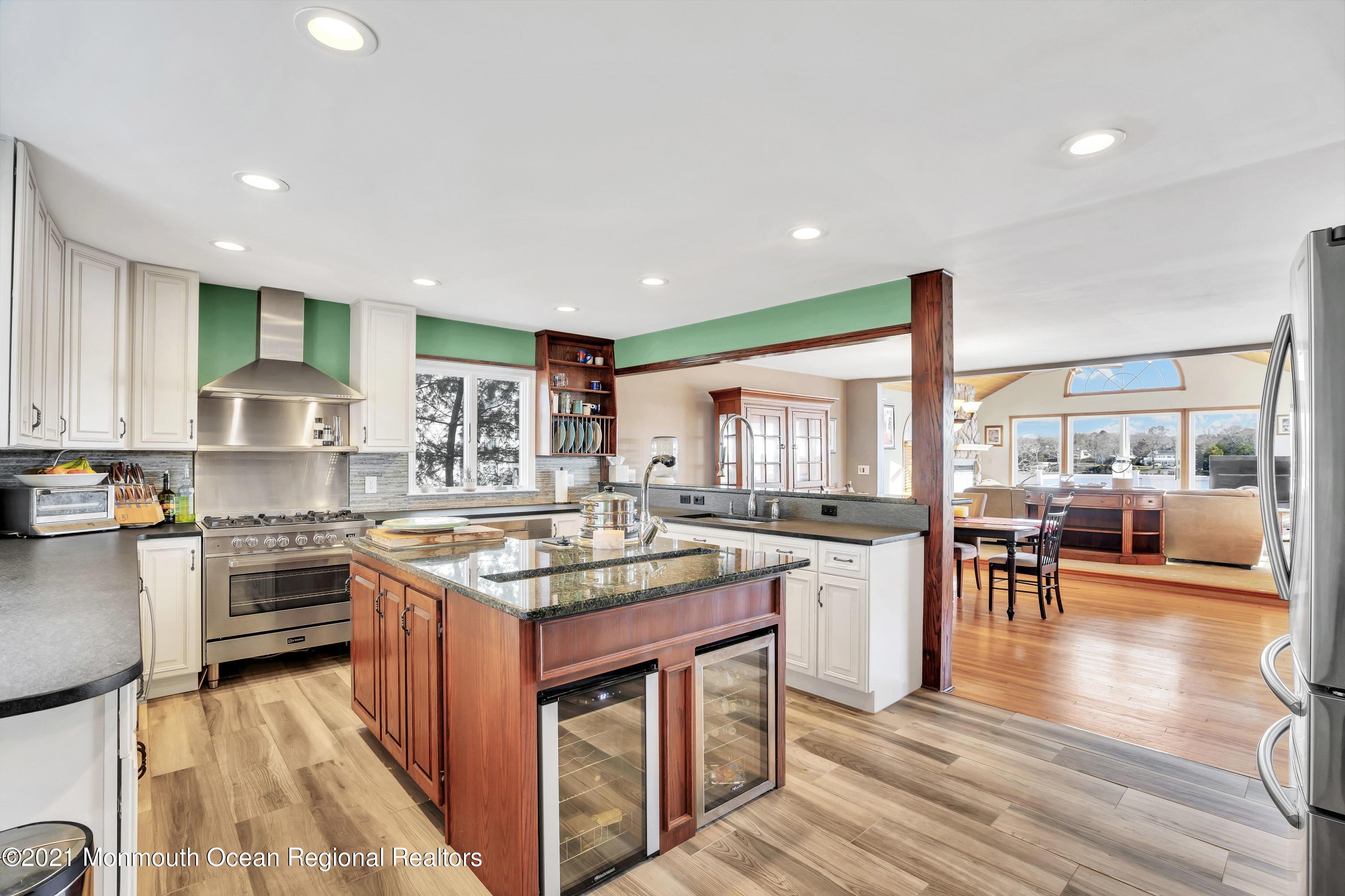 139 Riverside Drive North Brick, NJ 08724 - Photo 10 of 67 a kitchen with stainless steel appliances granite countertop a stove oven and a refrigerator