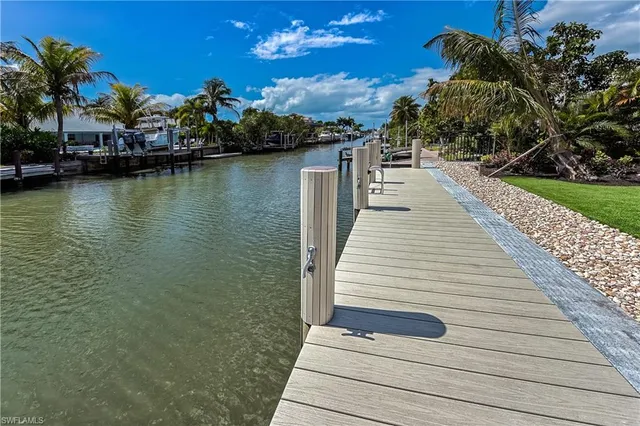 a view of a patio with lake view
