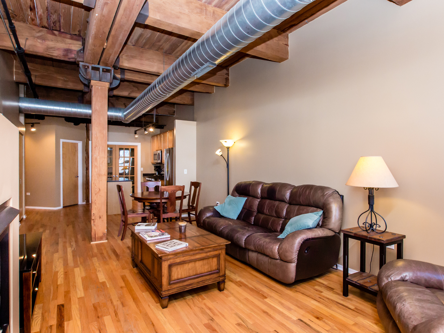 1500 West Monroe Street, Unit 524 Chicago, IL 60607 - Photo 5 of 20 a living room with furniture and wooden floor
