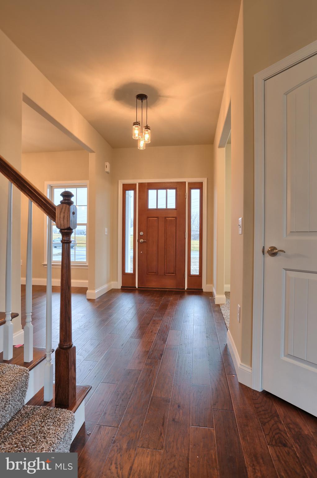 26 Rolling Meadow Road Lebanon, PA 17046 - Photo 4 of 29 a view of a livingroom with wooden floor and large windows