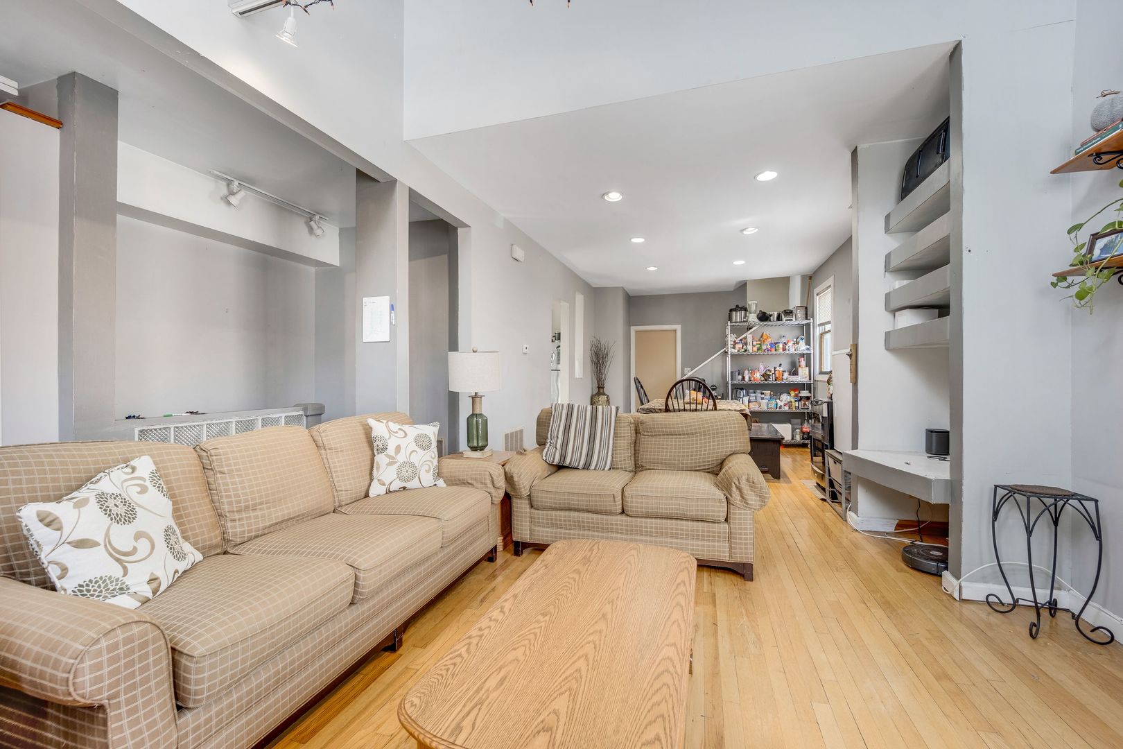 Undisclosed Address Chicago, IL 60657 - Photo 7 of 13 a living room with furniture and a couch