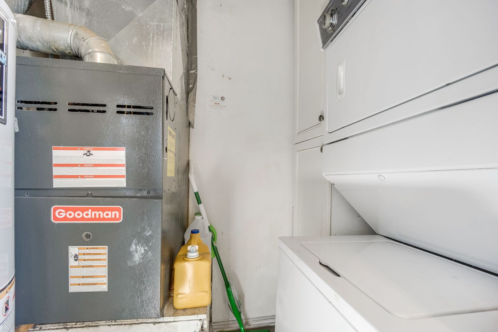 Undisclosed Address Chicago, IL 60657 - Photo 8 of 13 a utility room with a washer and dryer