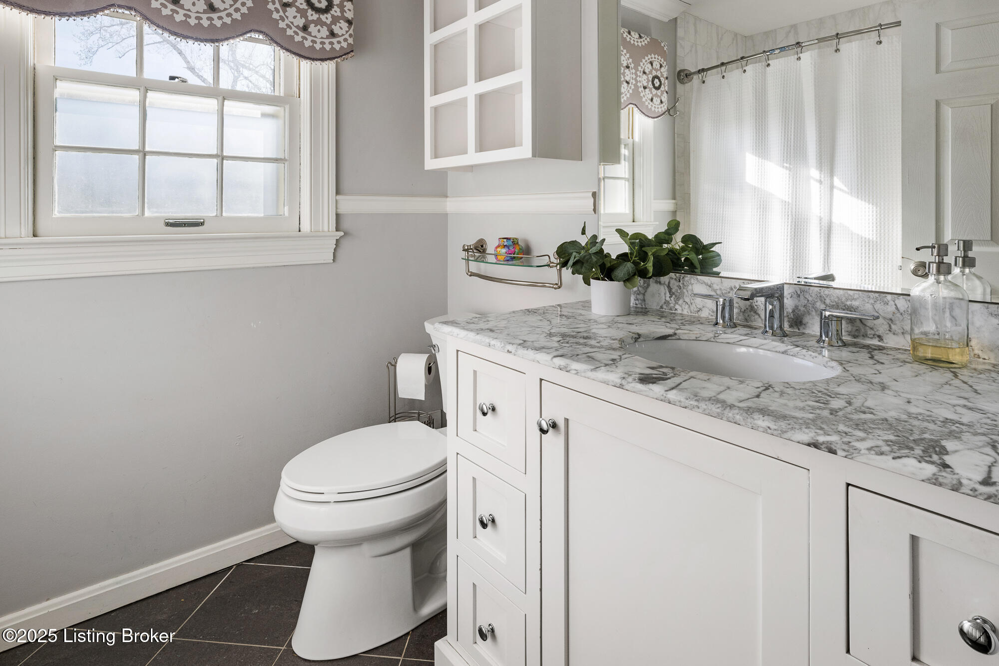217 Sequoya Road Louisville, KY 40207 - Photo 28 of 34 bathroom features marble countertop and shower/tub combo