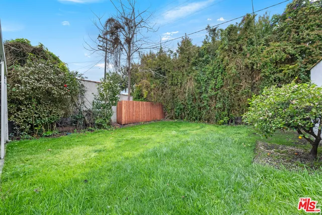 a fire hydrant in the middle of a field