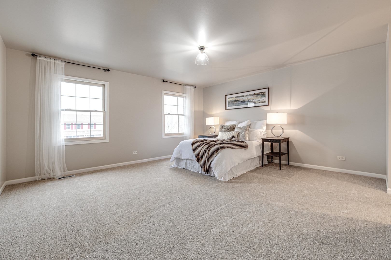 154 Barnes Road Elgin, IL 60124 - Photo 17 of 31 a bedroom with a bed and a window