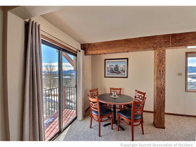 48 AB Road Silverthorne, CO 80498 - Photo 13 of 25 a dining room with furniture and front door