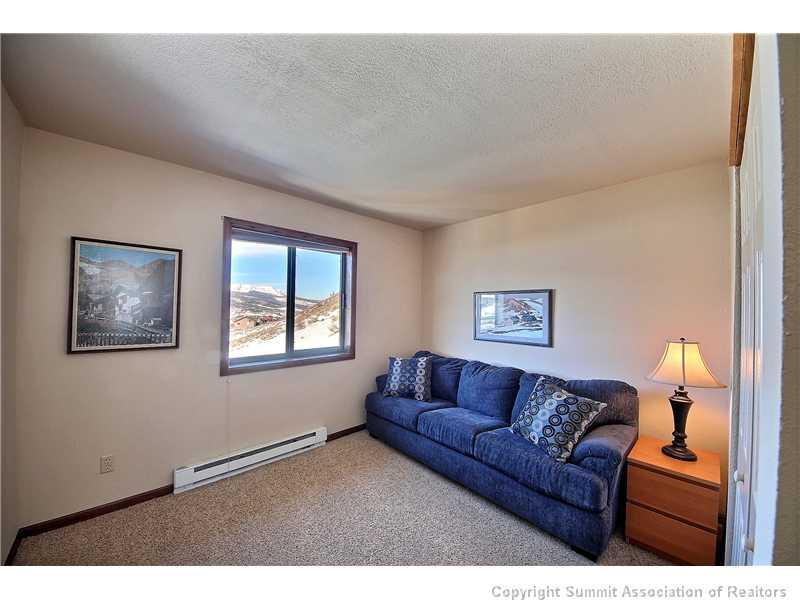 48 AB Road Silverthorne, CO 80498 - Photo 16 of 25 a living room with furniture and a window