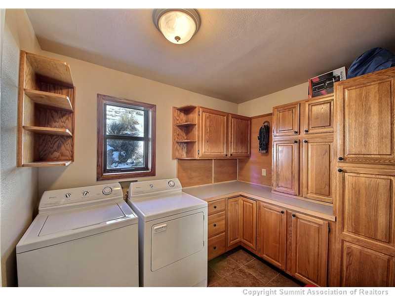 48 AB Road Silverthorne, CO 80498 - Photo 19 of 25 a utility room with dryer and washer
