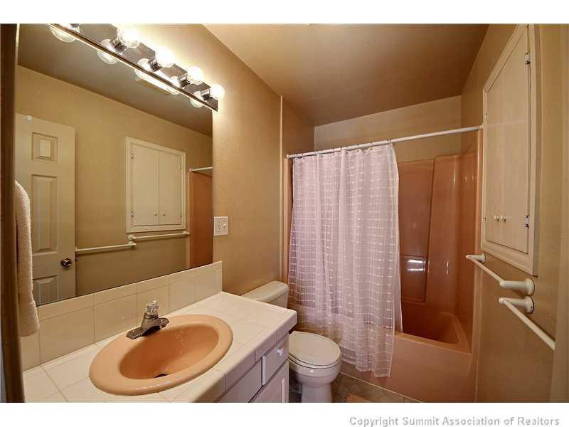 48 AB Road Silverthorne, CO 80498 - Photo 20 of 25 a bathroom with a sink toilet and shower