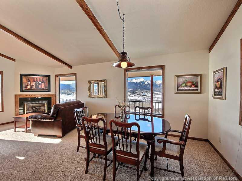 48 AB Road Silverthorne, CO 80498 - Photo 7 of 25 a view of a dining room with furniture a rug and wooden floor