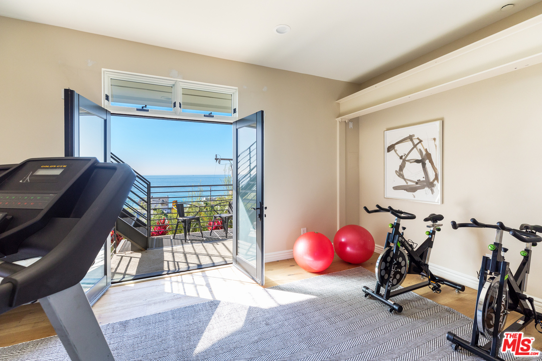 21370 Rambla Vista Malibu, CA 90265 - Photo 20 of 22 a view of a room with gym equipment