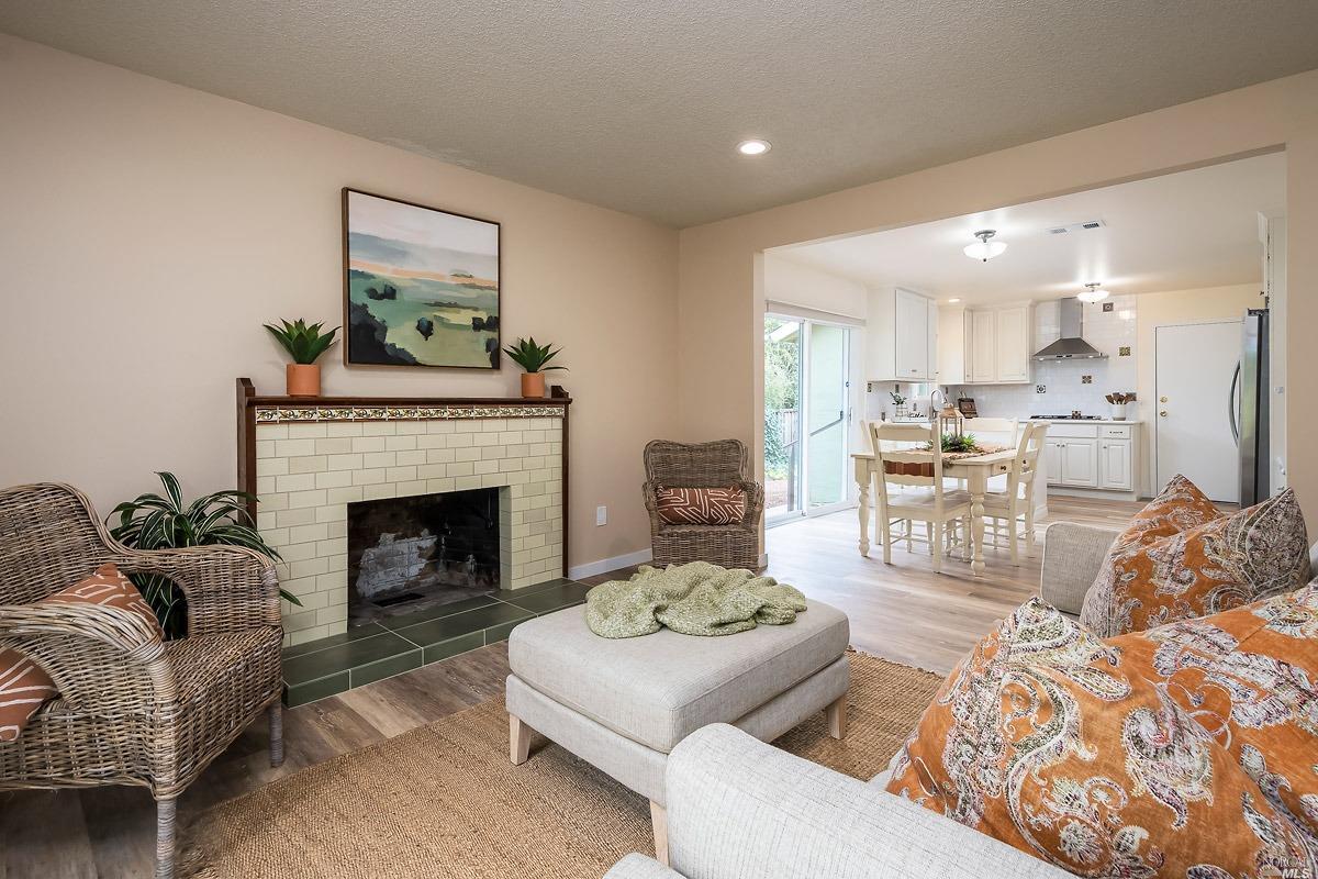 2480 Center Road Novato, CA 94947 - Photo 1 of 1 a living room with furniture and a fireplace