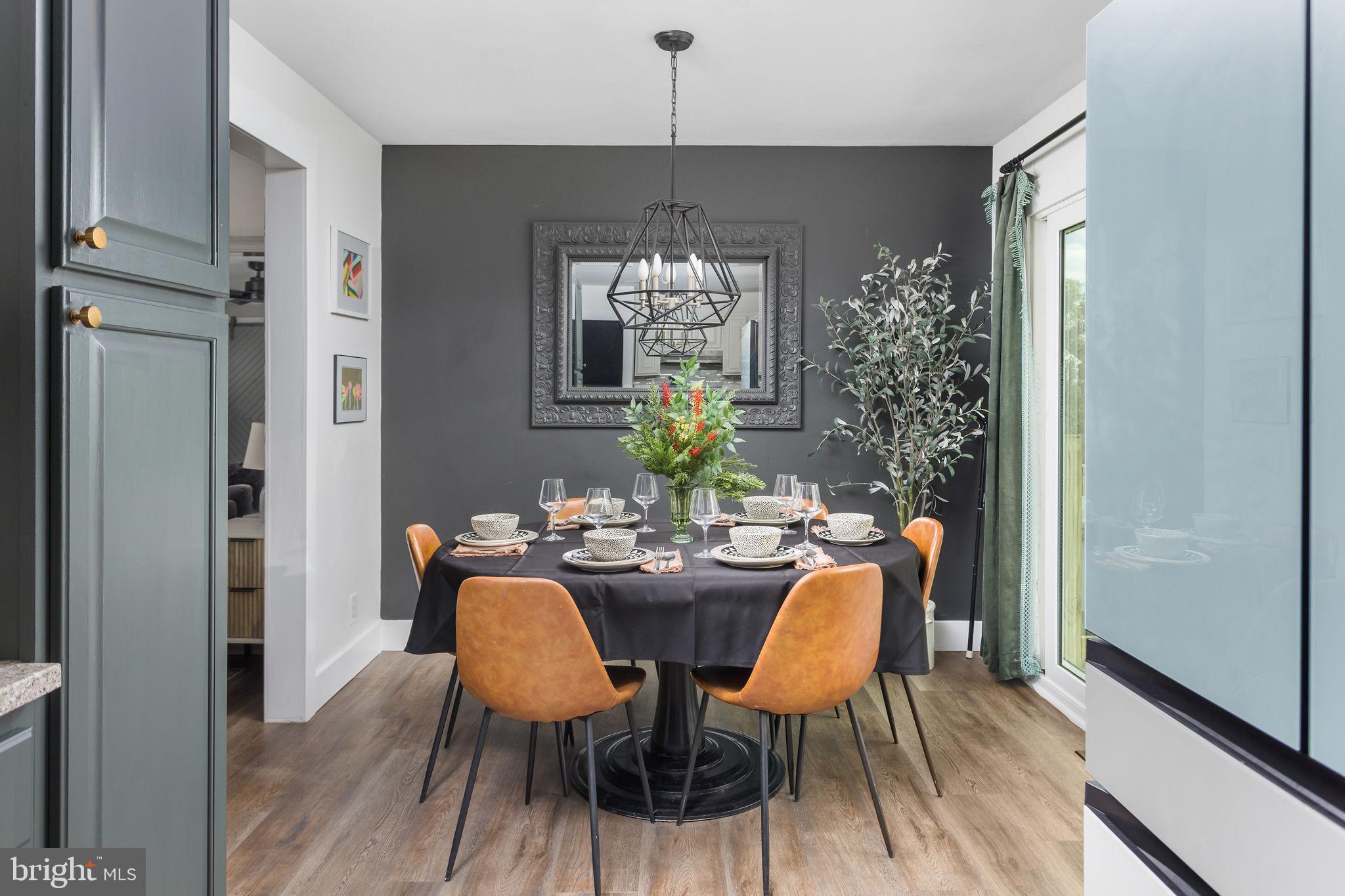 2 Spruce Road Burlington, NJ 08016 - Photo 12 of 34 a view of a dining room with furniture window and wooden floor