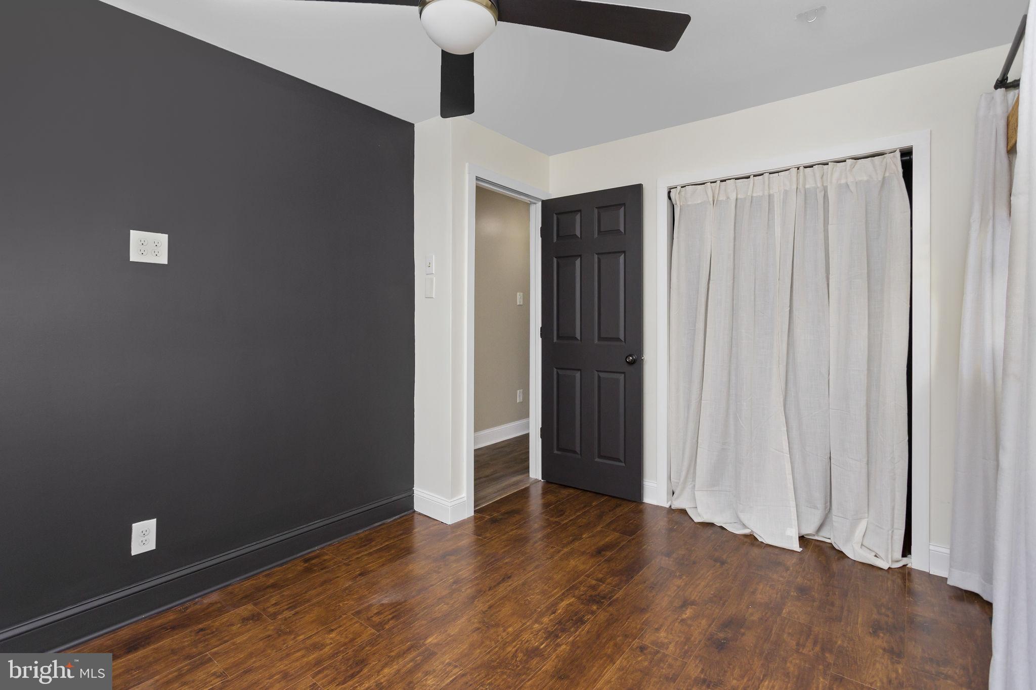 2 Spruce Road Burlington, NJ 08016 - Photo 19 of 34 a view of an empty room with wooden floor