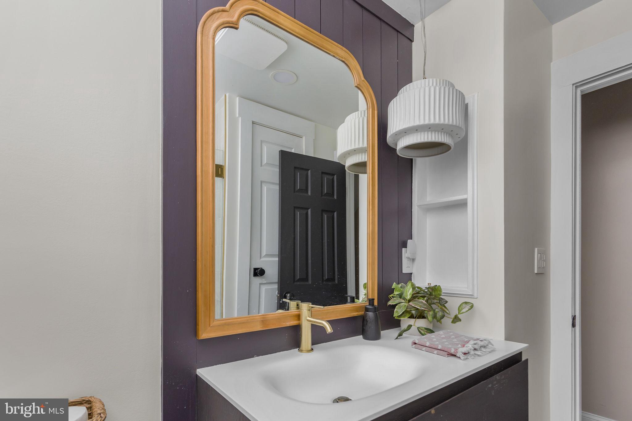 2 Spruce Road Burlington, NJ 08016 - Photo 21 of 34 a bathroom with a sink and a mirror