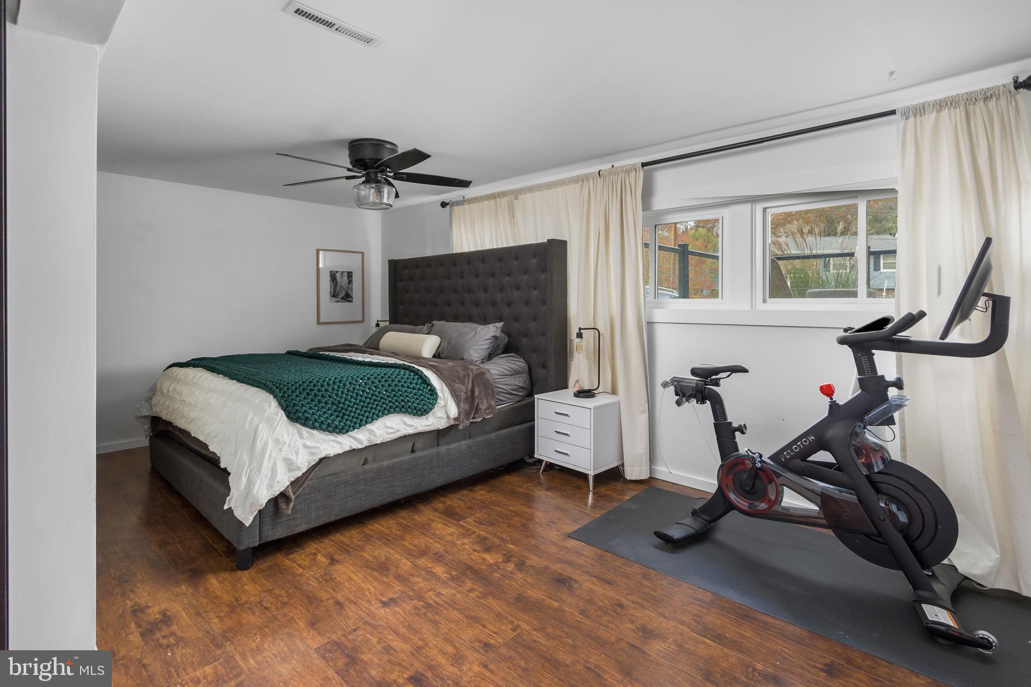 2 Spruce Road Burlington, NJ 08016 - Photo 22 of 34 a bedroom with a bed and wooden floor